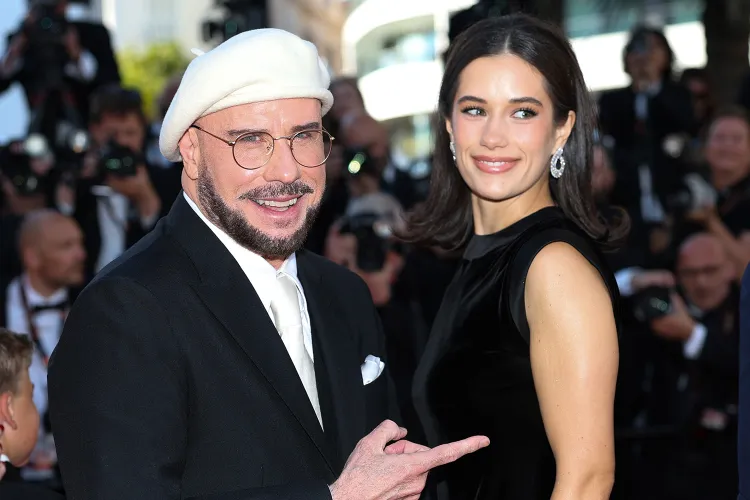 john-travolta-ella-bleu-travolta-cannes-051526-1-e4d718faf03a4d69874187e8892066f5.webp